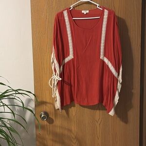 Umgee open wrap too small/medium can fit Lg/xl